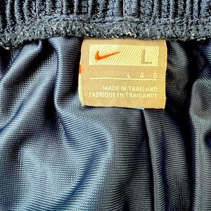 Gently worn vintage Nike basketball shorts; men’s large with 9-inch inseam.